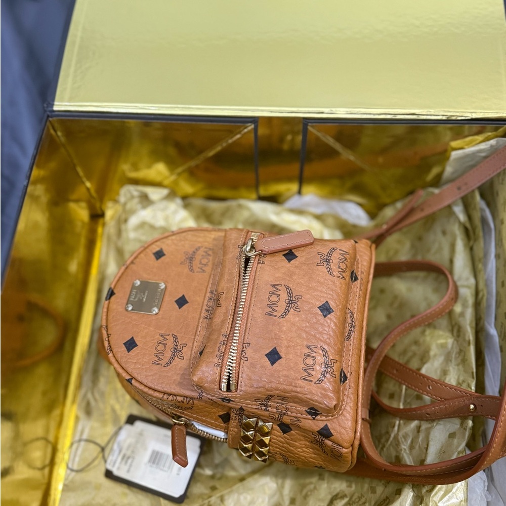 MCM Cognac Leather Backpack with Gold Accents